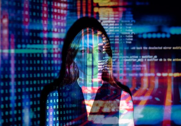 photo of code projected over woman